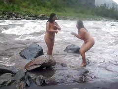 Two indian mature womens  bathing in river naked 